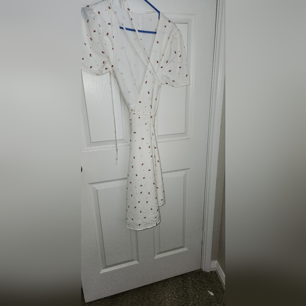 White wrap dress with red flowers